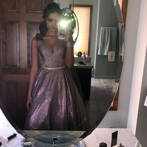 Sparkly dress with mesh sides that have diamonds